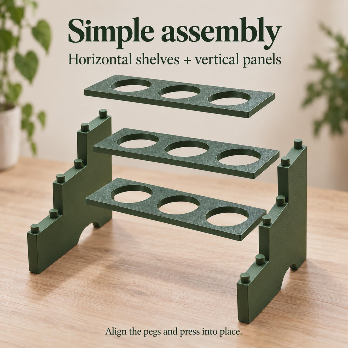 Exploded view of a dark green three-tier propagation tray showing three horizontal shelves, each with three circular cup openings, and two stepped vertical side panels with connecting pegs. Text instructs users to align the pegs and press into place.