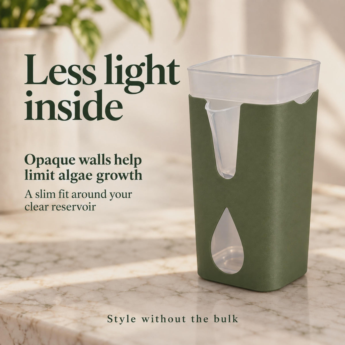 Olive green cover surrounds a clear reservoir, limiting light exposure while keeping the water level visible.